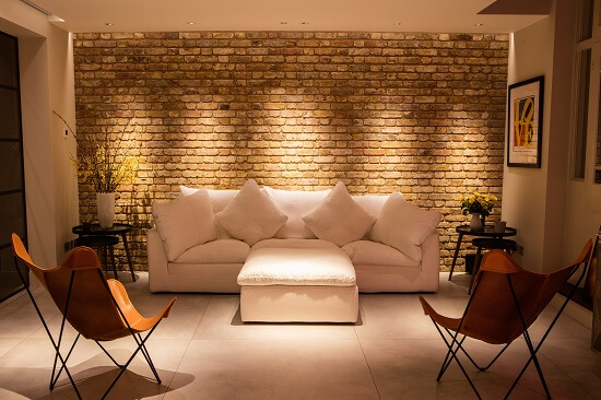 Exposed brick wall in a house extension